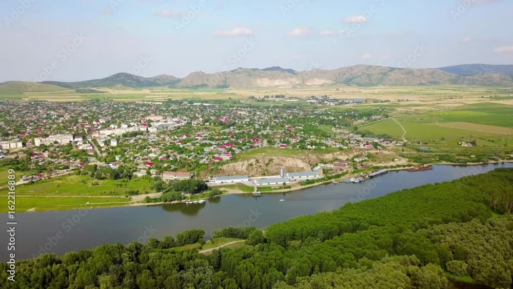 Aerial view of a small town in the Balkans and Danube Aerial view of a small town in the Balkans and Danube