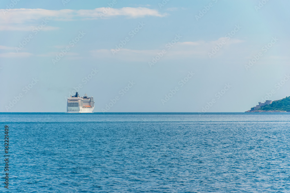 A huge liner with tourists went to the open sea.