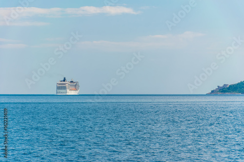 A huge liner with tourists went to the open sea. © Sergej Ljashenko