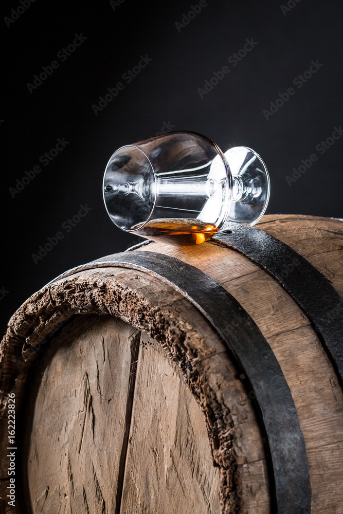 Old and tasty whisky on oak barrel