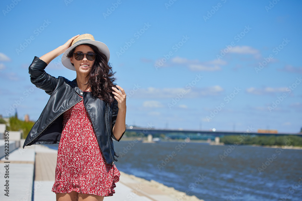 Beautiful Woman to Go in the City. Toned Photo with Copy Space. Beautiful Woman to Go in the City. Toned Photo with Copy Space.