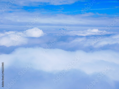 Peaks of tatras mountains above the clouds, Slovakia. © cegli