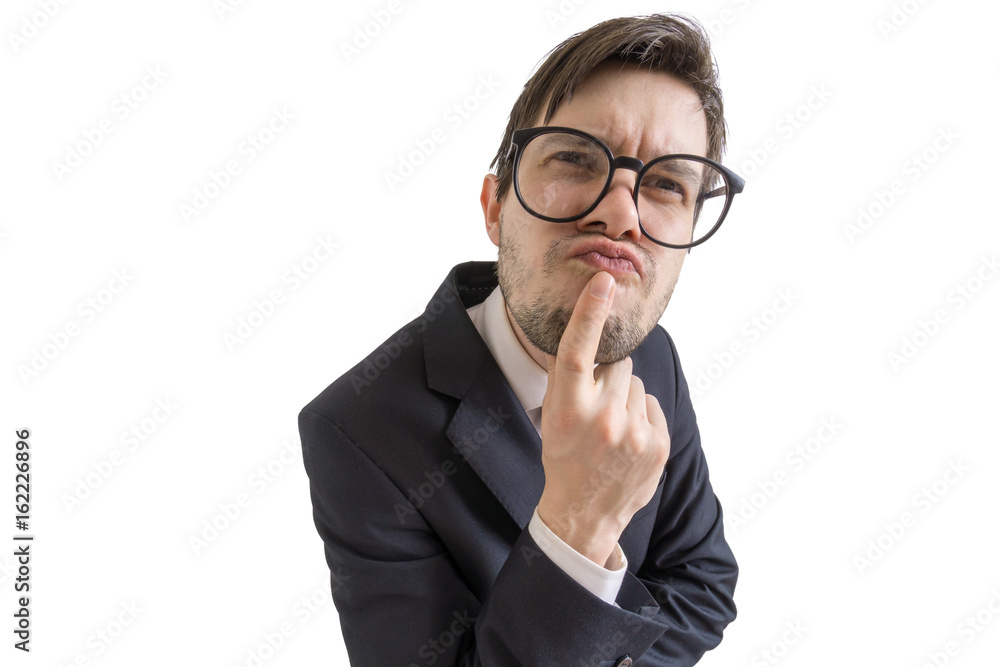 Funny suspicious or confused businessman is looking at you. Isolated on white background.