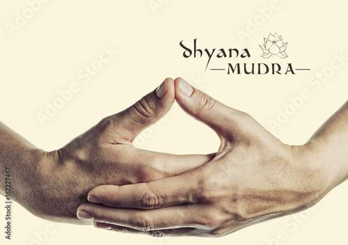 Dhyana mudra. Yogic hand gesture. Isolated on toned background. photo