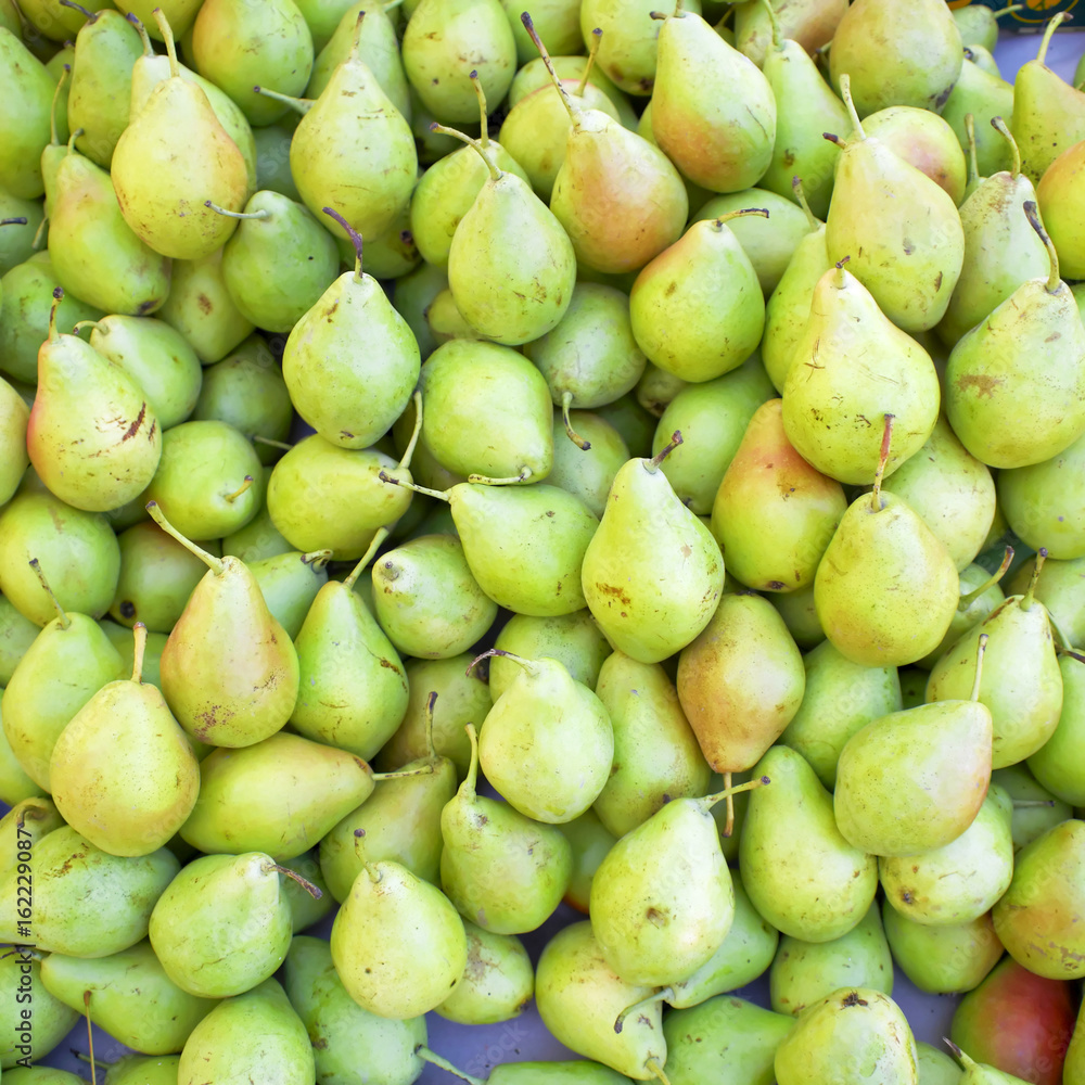 fresh green pears closeup, natural background