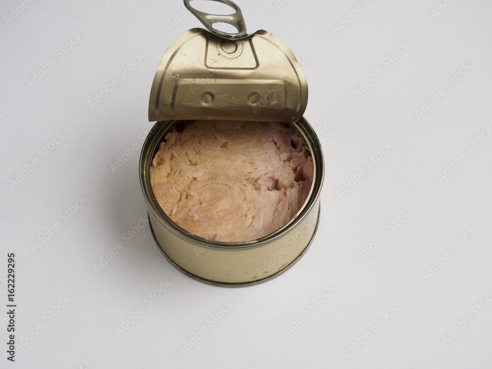 Tuna canned on white background Tuna canned on white background