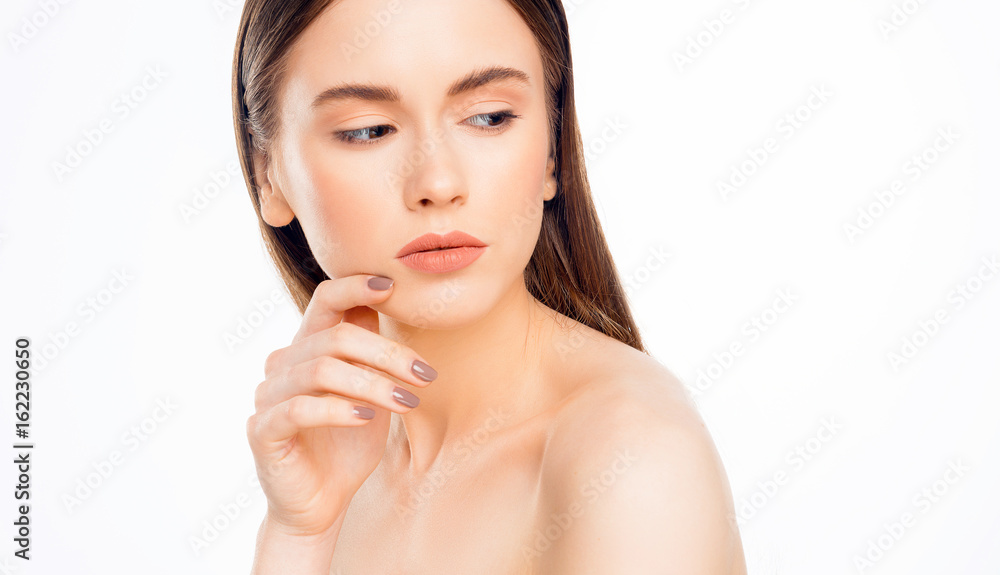 Naklejka premium Portrait of Beautiful Woman with Clean Skin, Natural Make Up and Long Shiny Hair. Cosmetology, Beauty and Spa. Close Up