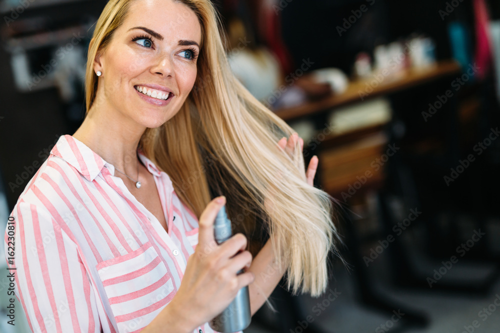 Portrait of cheerful young beautiful blonde woman