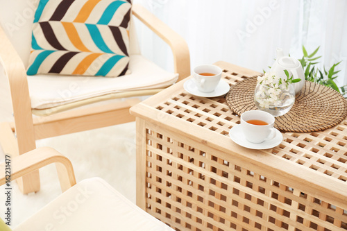 Wooden coffee table in mode...