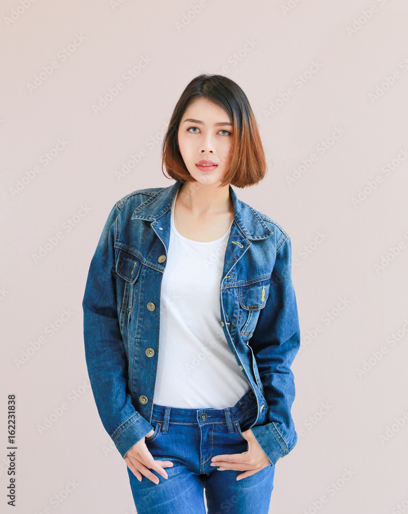 Asian woman casual outfits standing in jeans and blue denim shirt, women  brown hair and short hair, beauty and fashion jeans concept Stock Photo |  Adobe Stock