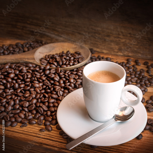 Cup of espresso with beans © gudrun