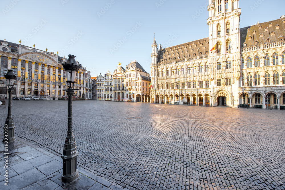 Morning view on the city hall at the Grand place central square in the old town of Brussels during the sunny weather in Belgium
