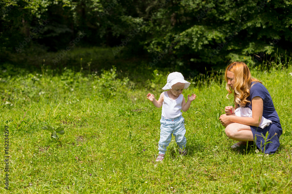 Mother and baby girl in nature Mother and baby girl in nature