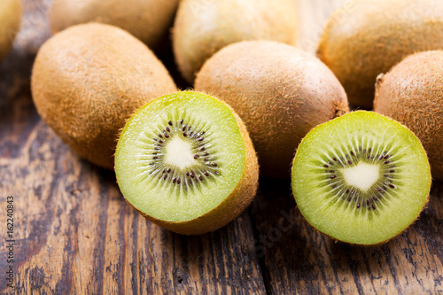 fresh kiwi fruit on wooden table
