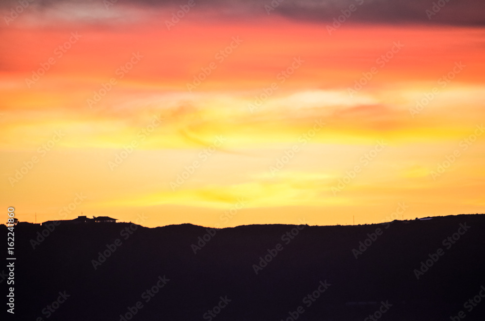 Colorful sunset on Coronado island with silhouettes of Cabrillo National Monument in San Diego, California