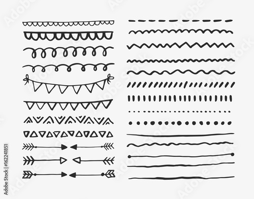 Set of hand drawn lines and dividers. Vector doodle design elements.