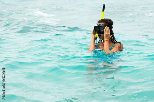 Woman in the sea during snorkeling