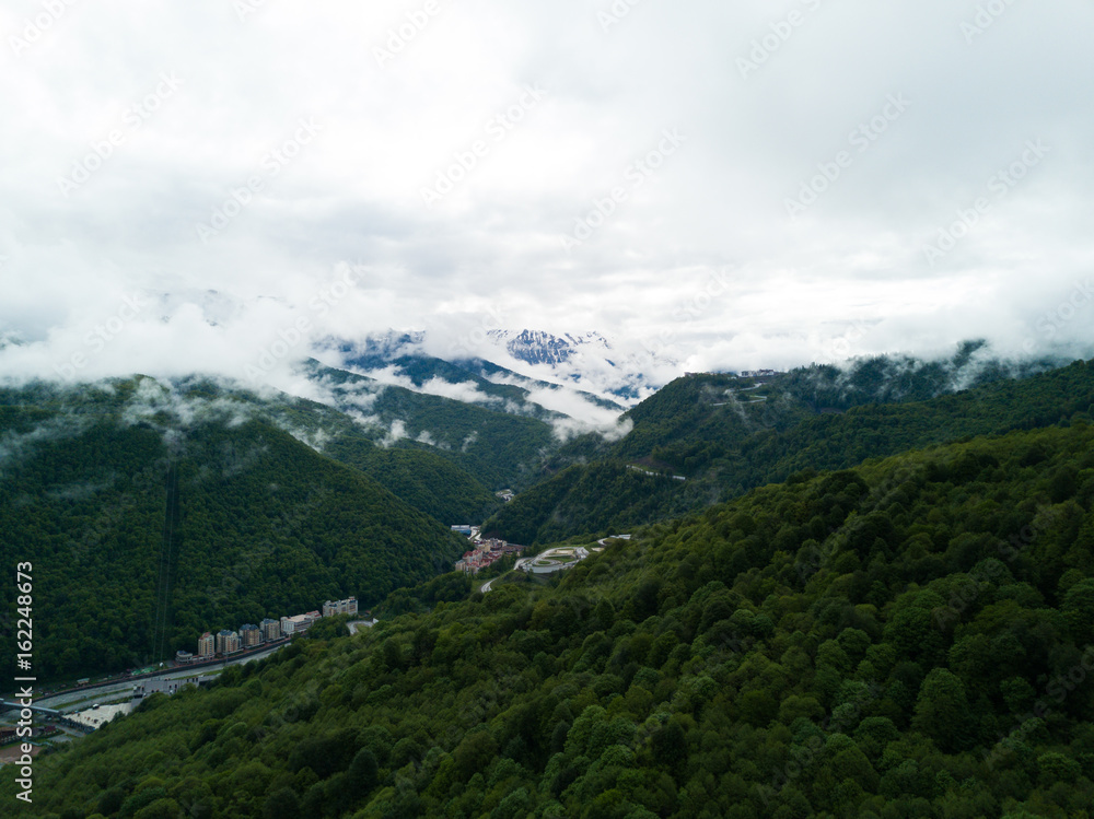 Naklejka premium SOCHI, RUSSIA - May, 2017: Aerial view above Ski Resort Rosa Khutor