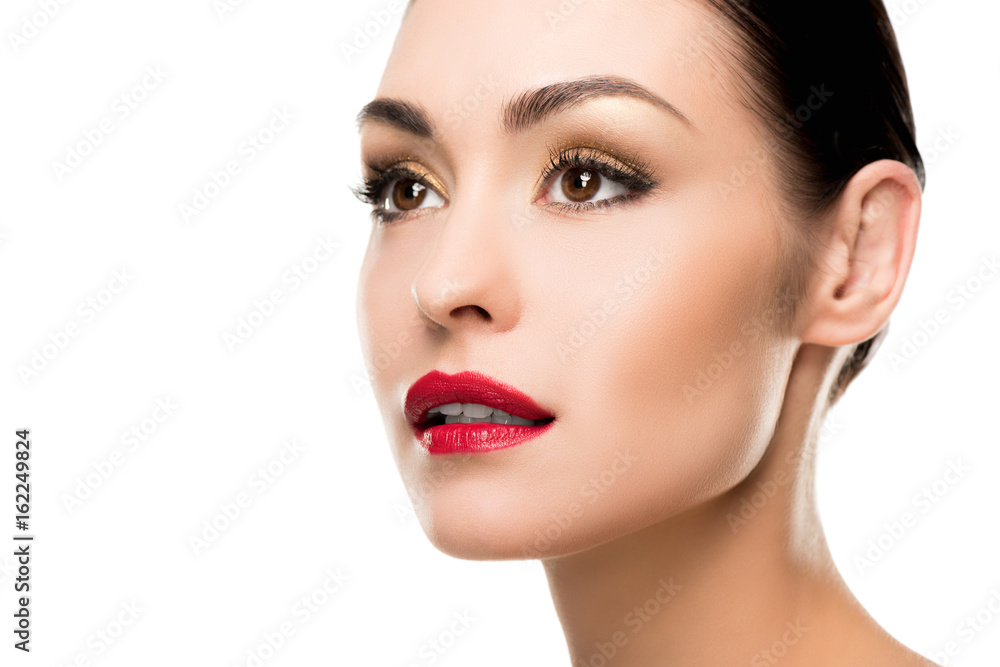 Close-up portrait of girl with perfect skin and beautiful makeup looking away isolated on white Close-up portrait of girl with perfect skin and beautiful makeup looking away isolated on white