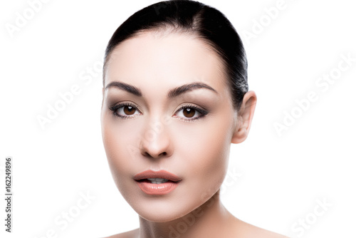 close up portrait of young attractive lady looking at camera isolated on white