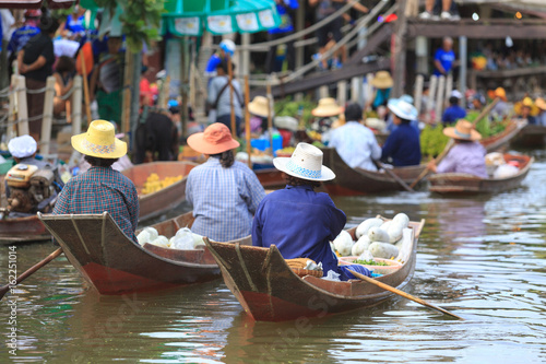 many of sellers making trading food and vegetable in floating market for tourist and people © photostriker