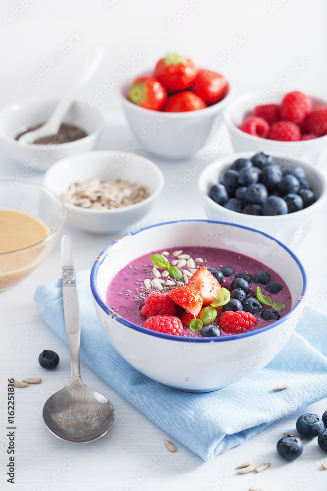 healthy berry smoothie bowl with strawberry blueberry raspberry and chia seed healthy berry smoothie bowl with strawberry blueberry raspberry and chia seed