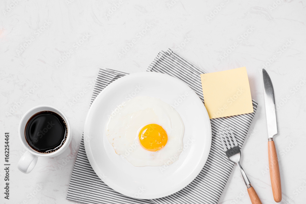 Top view of traditional healthy easy quick breakfast meal made of fried eggs served on a plate. Top view of traditional healthy easy quick breakfast meal made of fried eggs served on a plate.