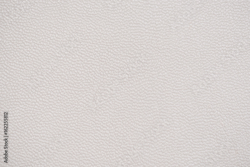 White leather texture as background.