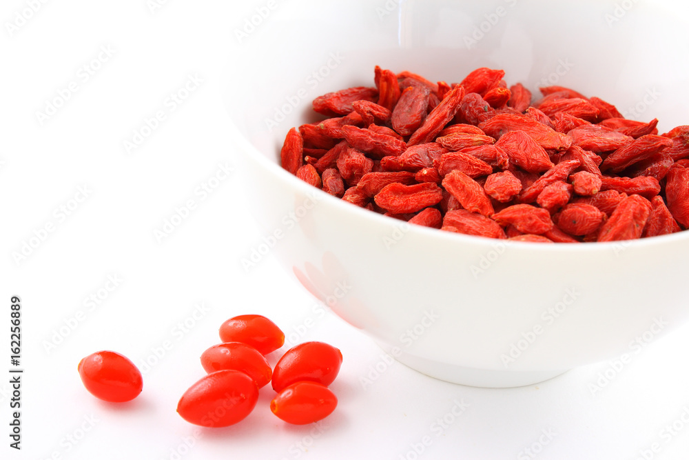 dried goji berries in a small white bowl dried goji berries in a small white bowl