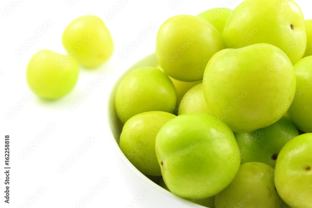 fresh turkish can erik plum fruits in a small white bowl fresh turkish can erik plum fruits in a small white bowl