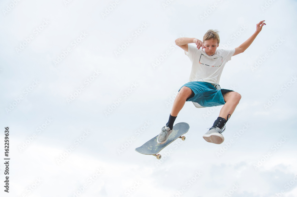 Young skateboarder in a jump