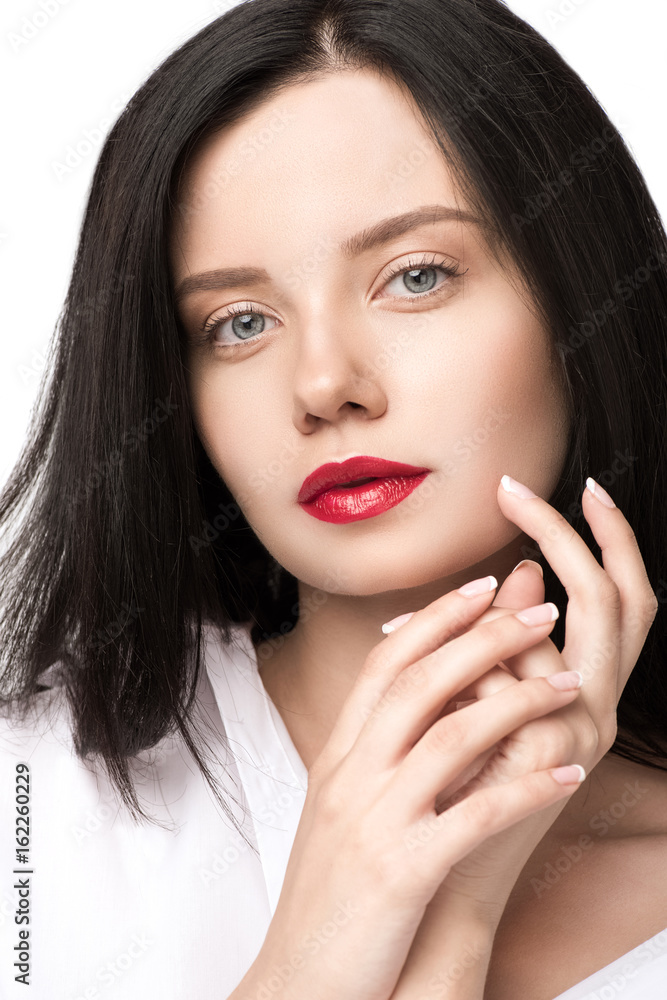 portrait of attractive pensive woman looking at camera isolated on white portrait of attractive pensive woman looking at camera isolated on white