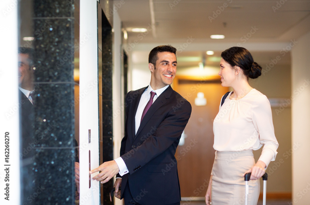 business team with travel bags at hotel elevator business team with travel bags at hotel elevator