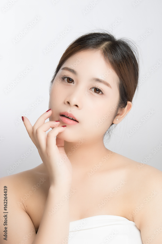 attractive beautiful asian woman skin care on white background