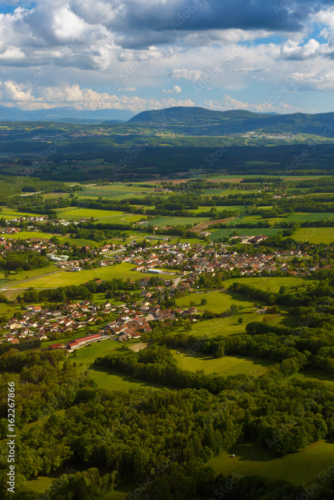 Landscape mountains, village houses. A view of the earth from the sky. Shooting with copter. France. Nature in summer