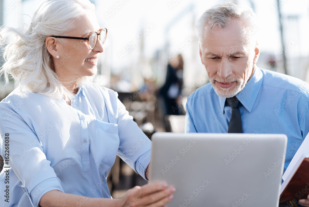 Attractive woman looking at her colleague Attractive woman looking at her colleague
