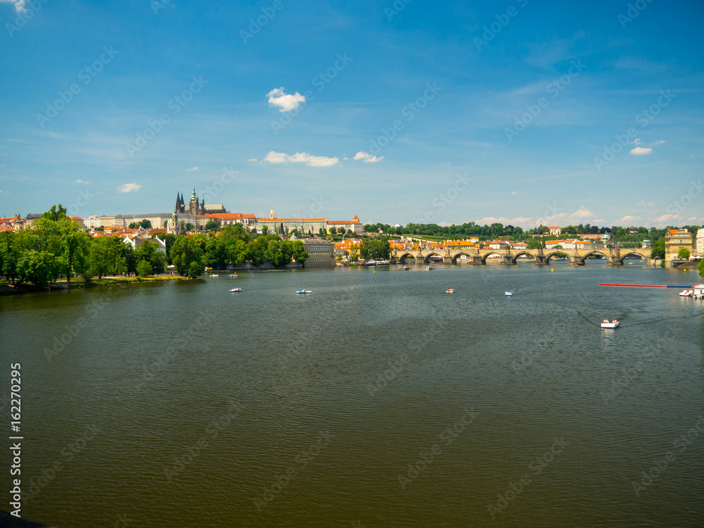 Obraz premium Prague, Chezh republic, 2017. The Vltava River flows through the centre of Prague, and is the waterway around which the city has developed over the past 1000 years.