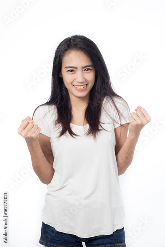 Wallpaper Mural Happy asian young woman doing victory sign  isolated on white background Torontodigital.ca