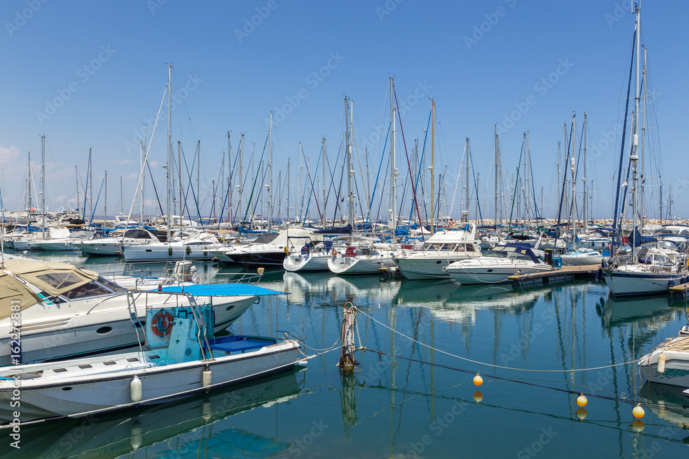 Boats and yachts moored off in marina of Larnaka, Cyprus