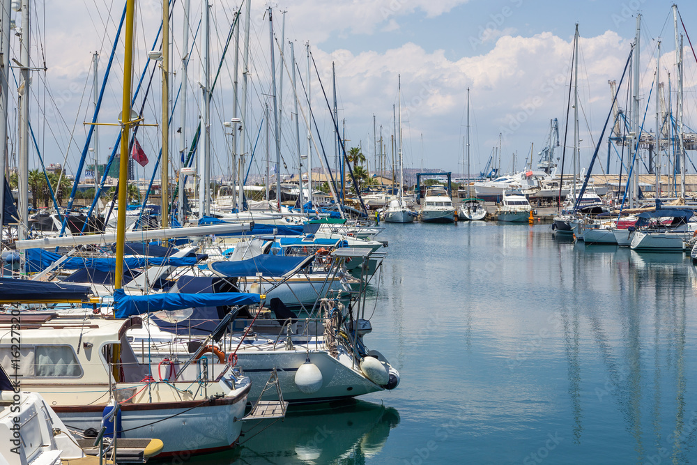 Boats and yachts moored off in marina of Larnaka, Cyprus Boats and yachts moored off in marina of Larnaka, Cyprus