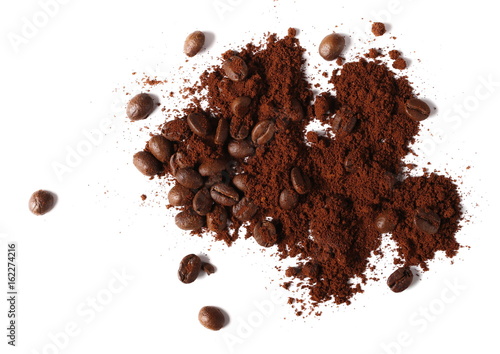 Pile of powdered, instant coffee and beans isolated on white background, top view