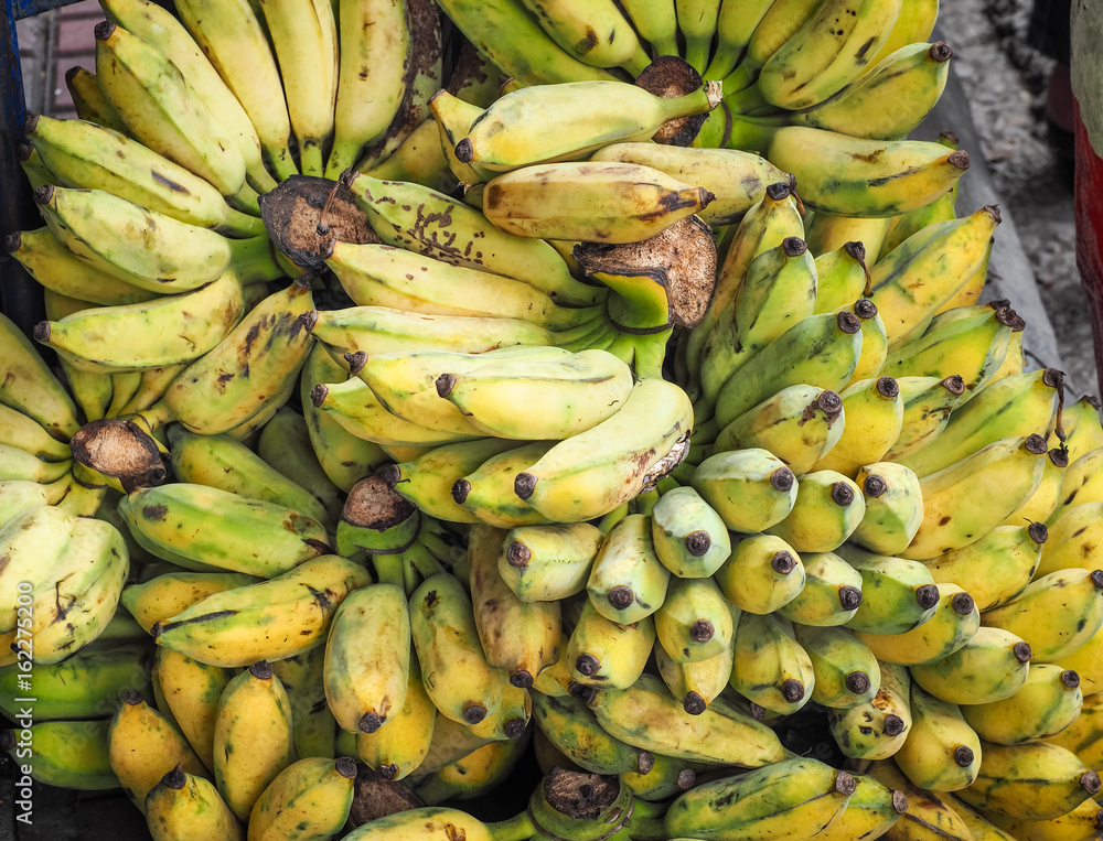 Bunch of ripened organic bananas at farmers market, Thailand