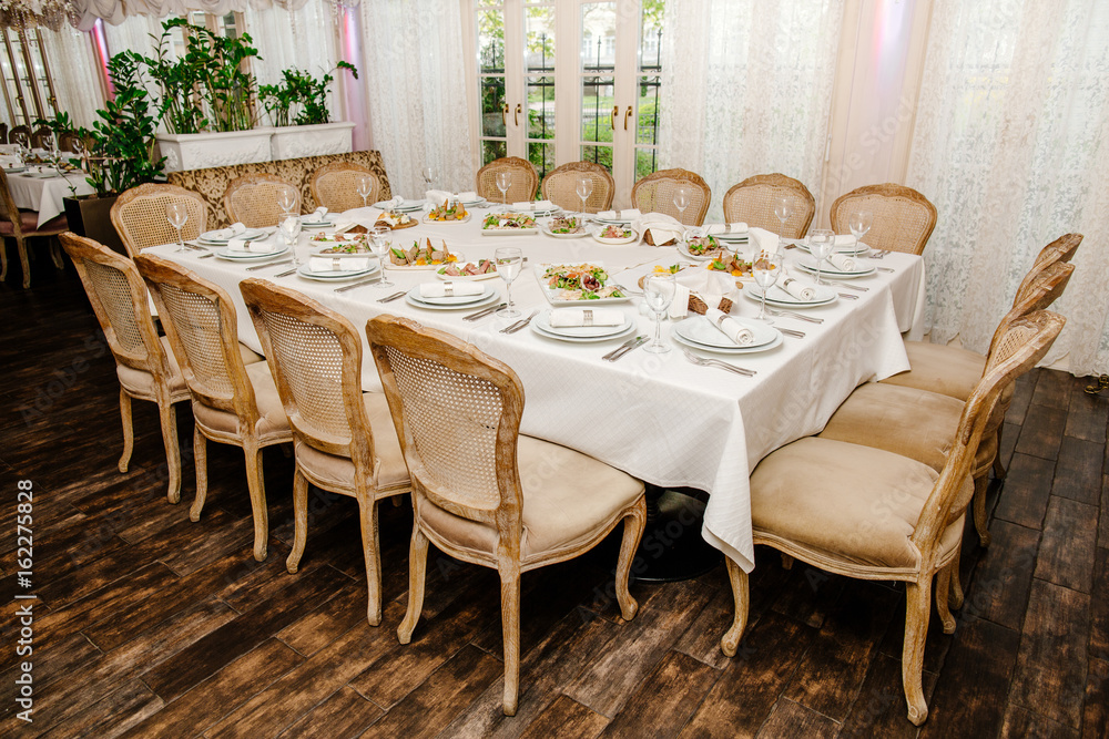 Luxury banquet table setting at restaurant Luxury banquet table setting at restaurant