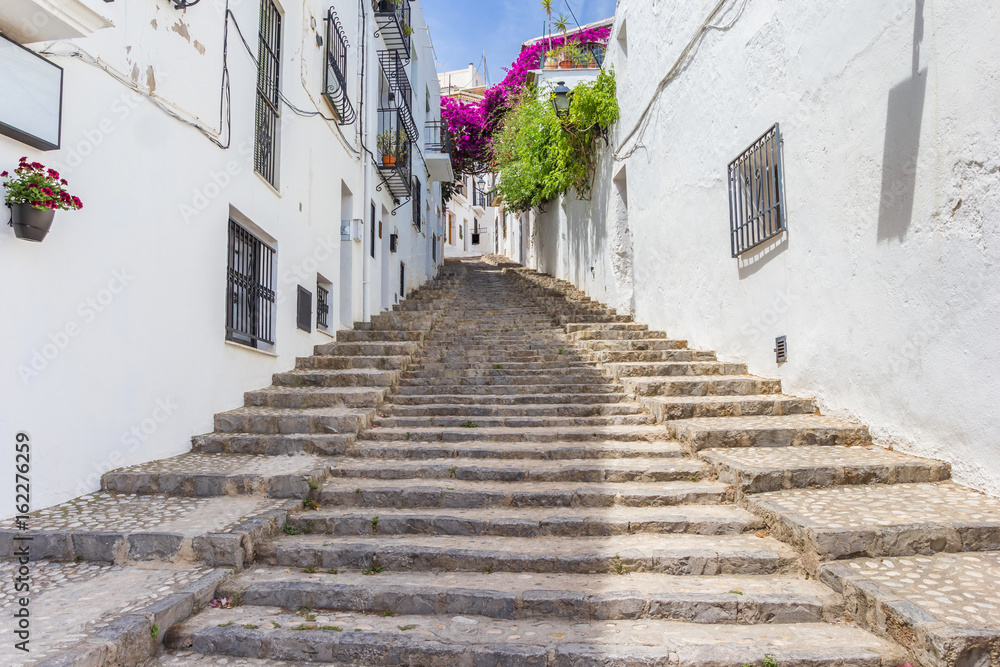 Long staircase in a whitewashed street in Altea