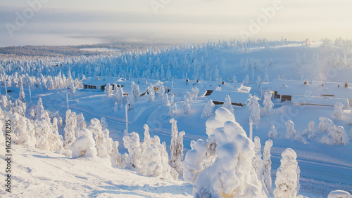 Canvas Print Beautiful cold mountain view of ski resort, sunny winter day with slope, piste a