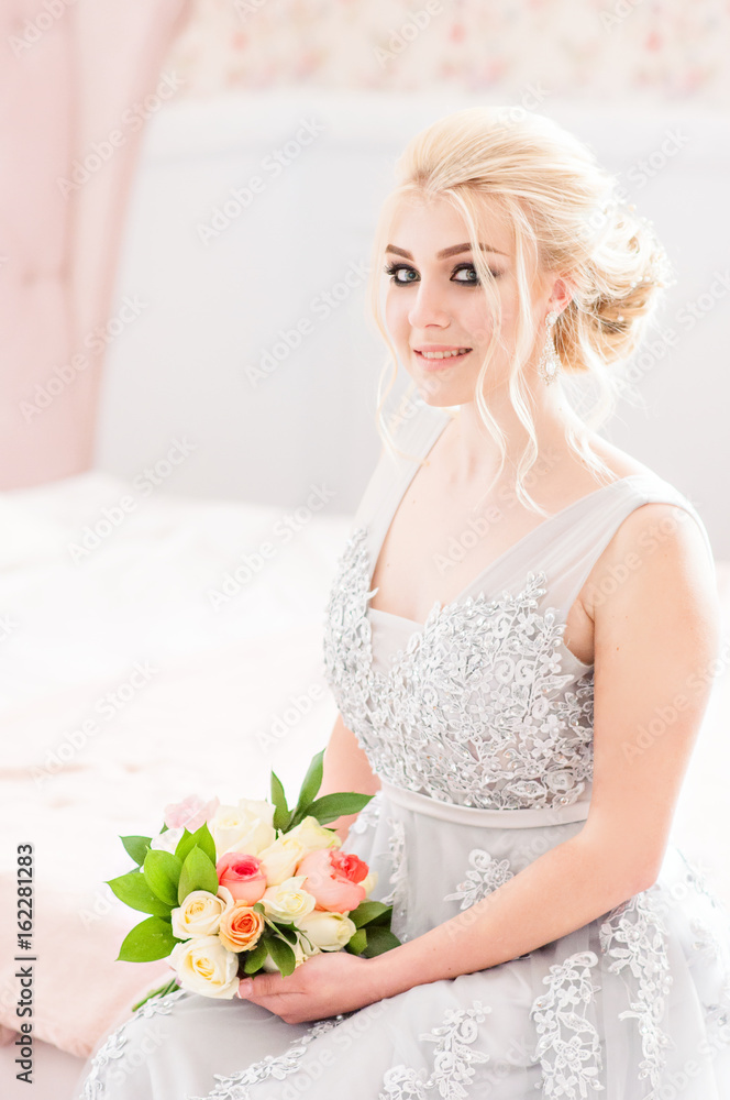 Fashion bride in gray dress with make-up smoky eyes Fashion bride in gray dress with make-up smoky eyes