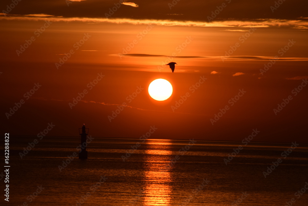 Wschód słońca - morze - obrazy, fototapety, plakaty 