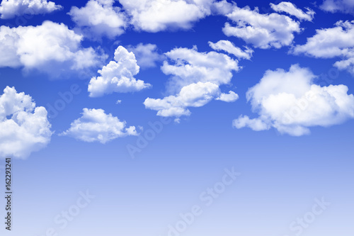 Fototapeta Naklejka Na Ścianę i Meble -  Bright blue sky with fluffy white clouds
