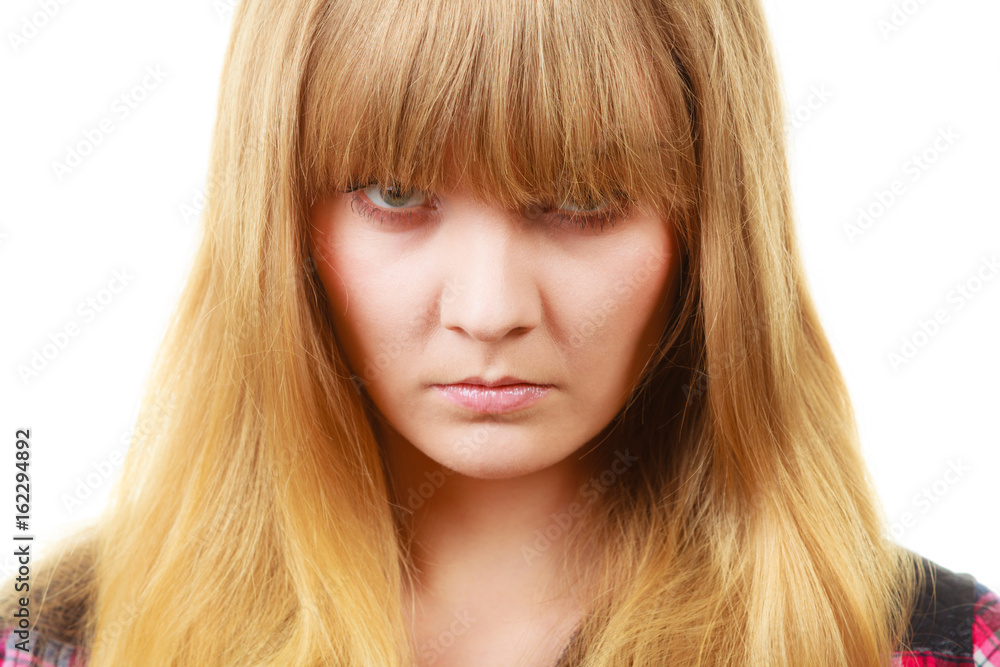 Angry looking woman, face covered in fringe Angry looking woman, face covered in fringe