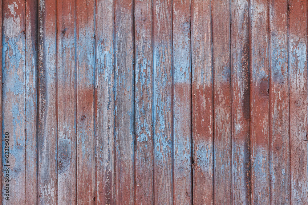 Background of old wooden board with cracked red paint Background of old wooden board with cracked red paint